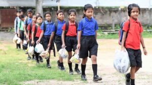 Every week, pupils at Akshar school must bring up to 20 items of plastic collected from their homes and the local area as their ‘fee’ for tuition. Photograph: Biju Boro/AFP/Getty Images