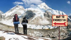 Mount Everest base camp with two tourists by DanielPrudek from Getty Images