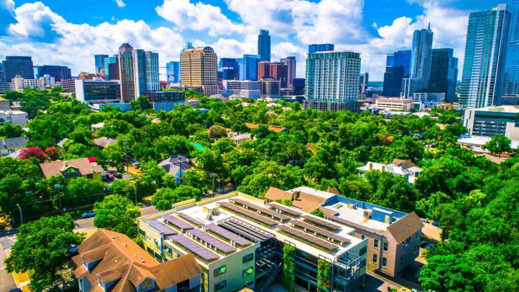 Solar Panel future of a renewable energy sustainable city by RoschetzkyIstockPhoto from Getty Images