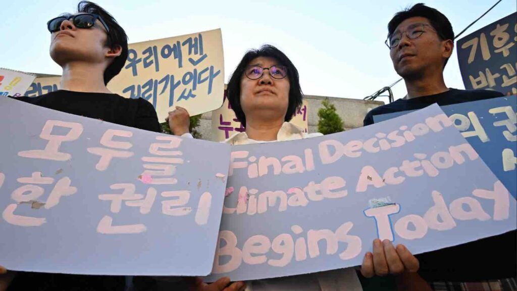 South Korean climate campaigners outside the constitutional court in Seoul. Photograph: Anthony Wallace/AFP/Getty Images