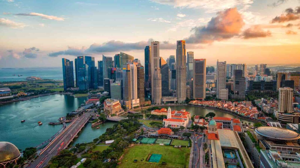 Singapore / Aerial view of Singapore business district and city at twilight in Singapore, Asia by shih-wei from Getty Images Pro