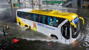 bus wades through a flooded road following heavy rains brought by Typhoon Gaemi, in Manila, Philippines. REUTERS/Lisa Marie David