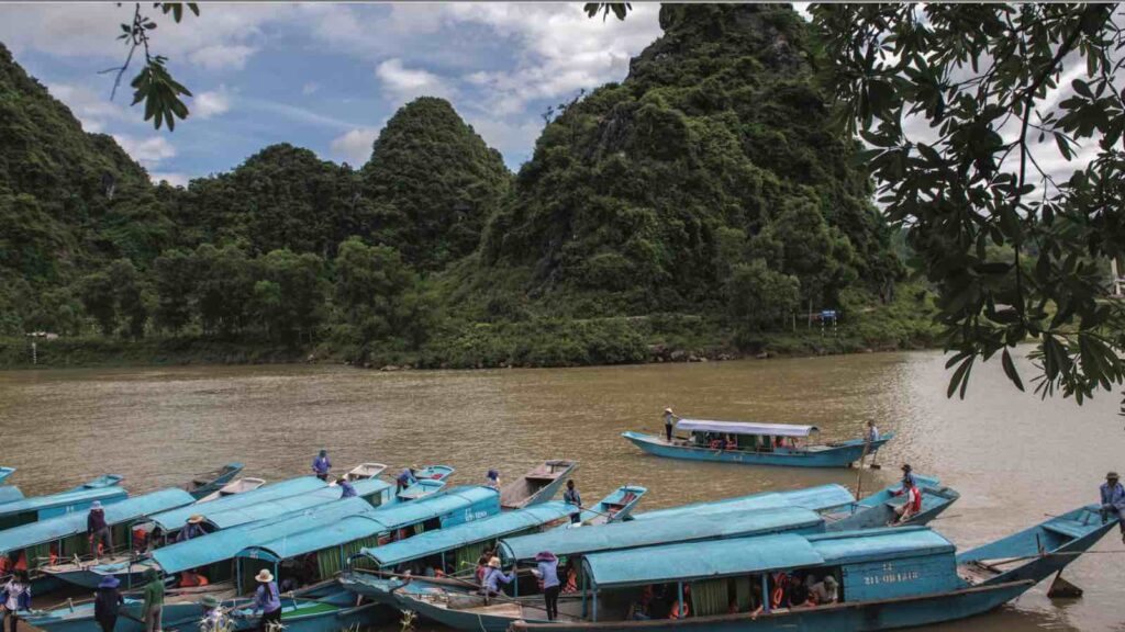 Blue boats transporting tourists going to Phong Nha cave. The pier was funded by ADB’s Greater Mekong Subregion Sustainable Tourism Development Project. Training programs also gave the local people opportunities to work in the tourism sector in and around the National Park (photo by Ariel Javellana).