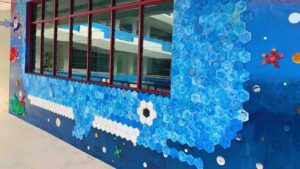 Creating Waves: Plastify and Ai Tong School's Whale Mural from 36kg of Recycled Plastic